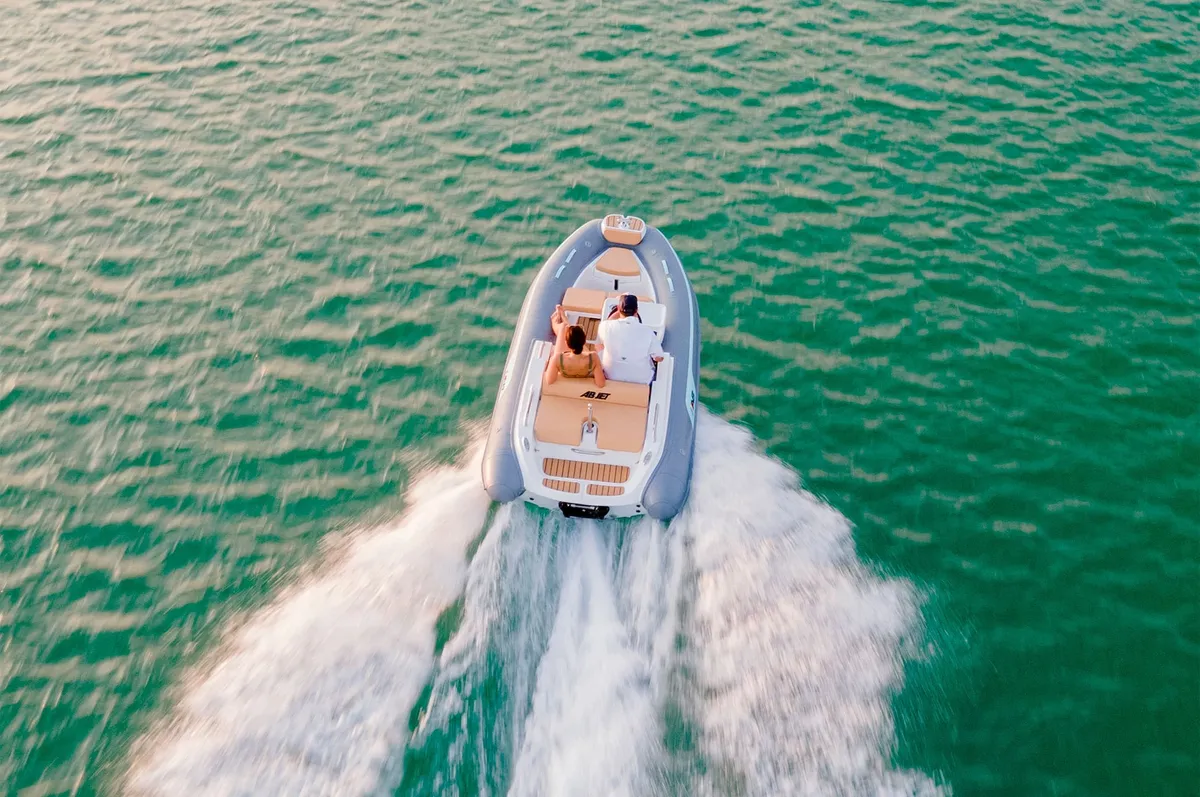 AB Inflatables ABJET 390 XP: Boat cruising at sea with foam