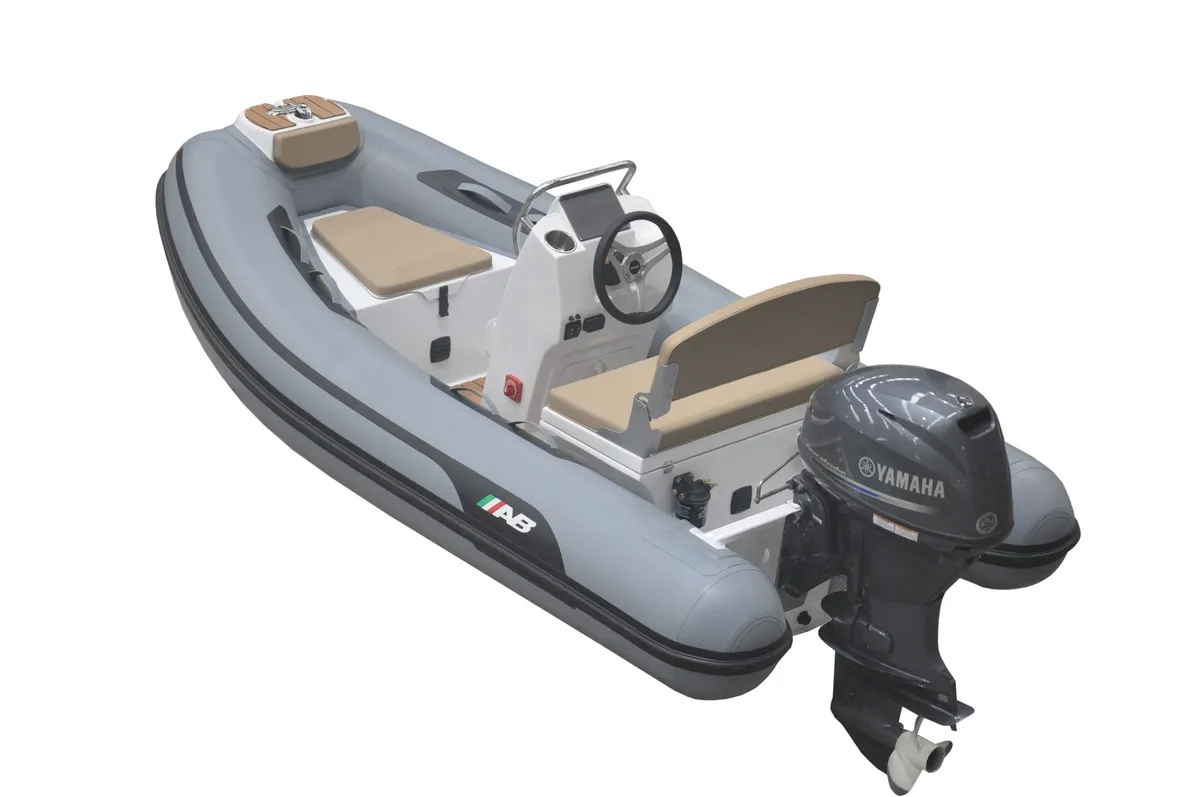 AB Inflatables Alumina 10 ALX: Rubber dinghy with an outboard motor on a white background