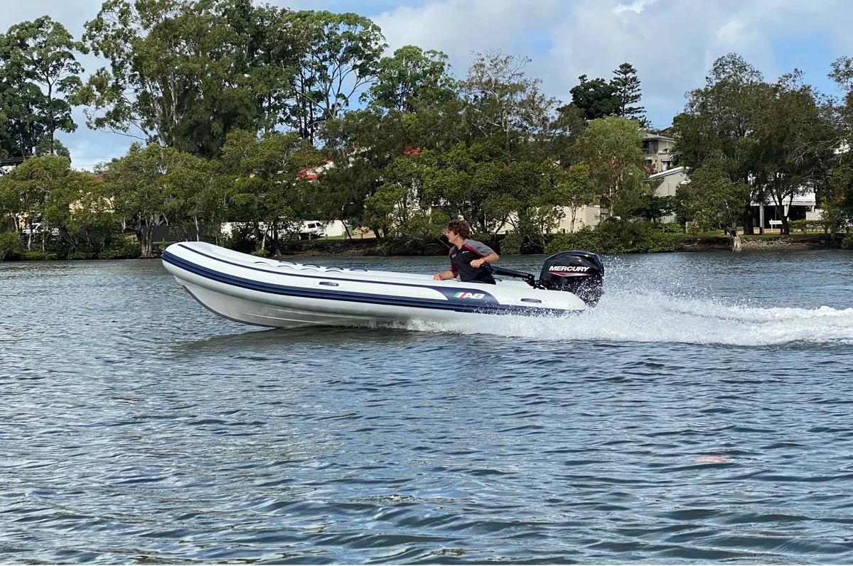 AB Inflatables Navigo 15 VS: A rubber dinghy speeds across the water