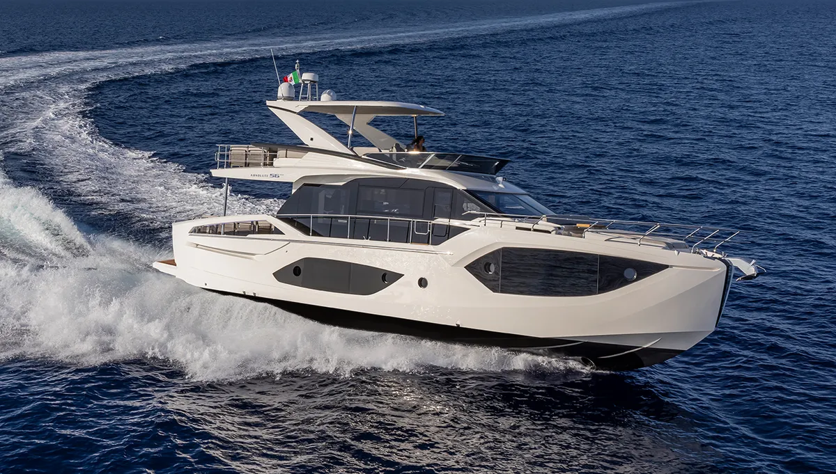 Absolute Yachts 56 FLY: White boat cruising at sea