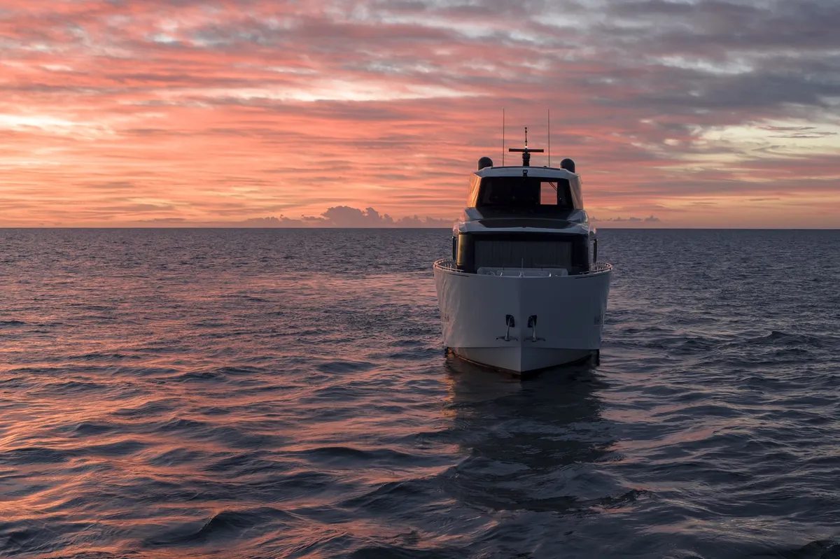 Astondoa Ax8: Boat at sea at sunset