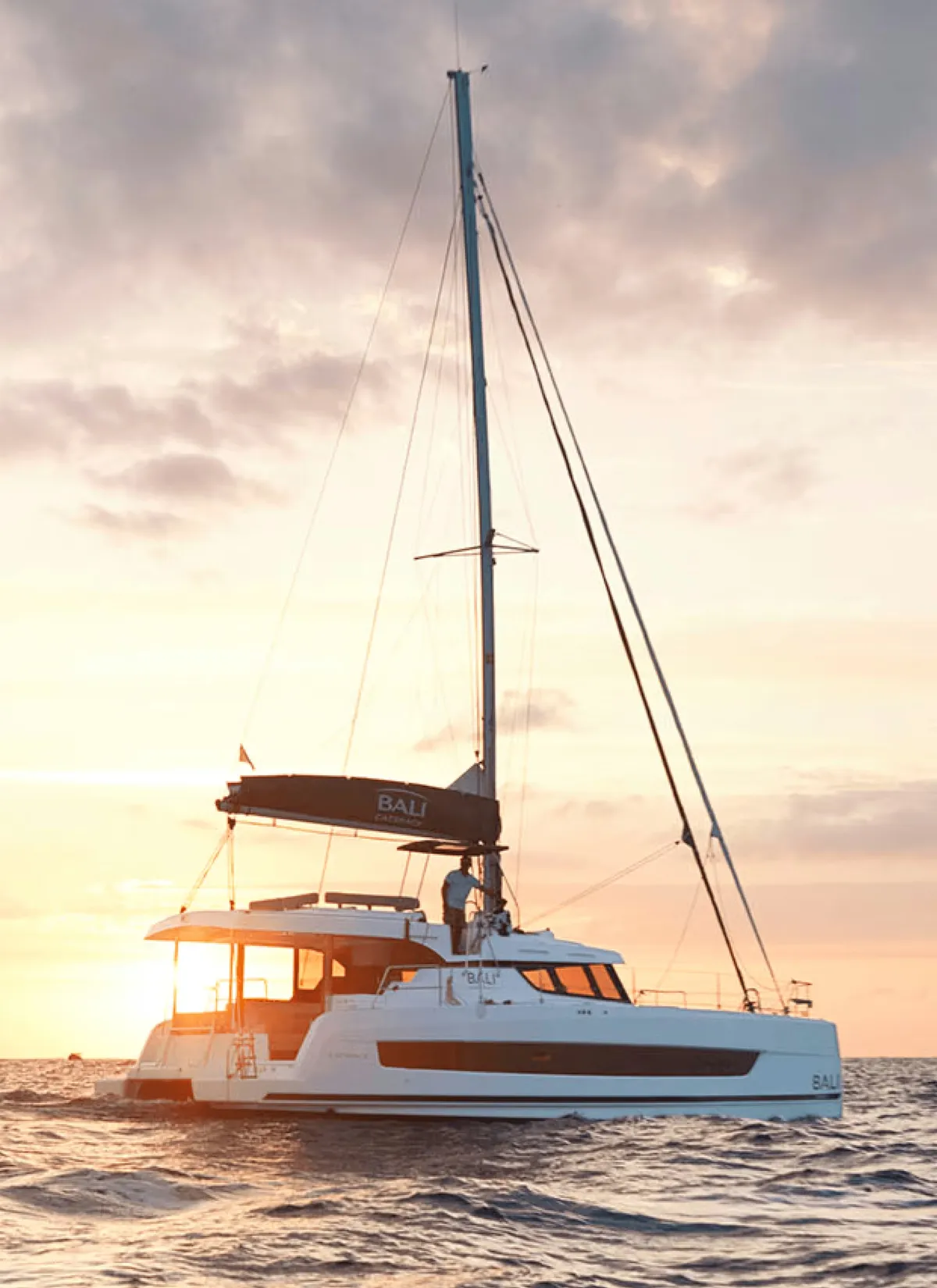 Bali Catamarans CATSPACE: Catamaran at sea at sunset