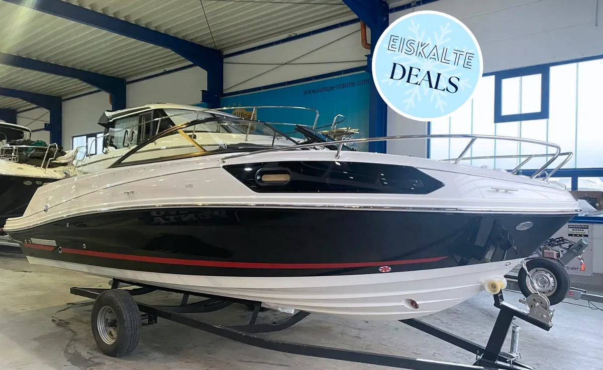 Bayliner VR6 Cuddy Outboard: Boat on a trailer in a boathouse