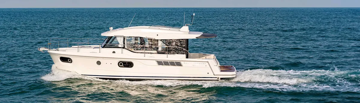 Beneteau Swift Trawler 41 Sedan: White motorboat cruising at sea