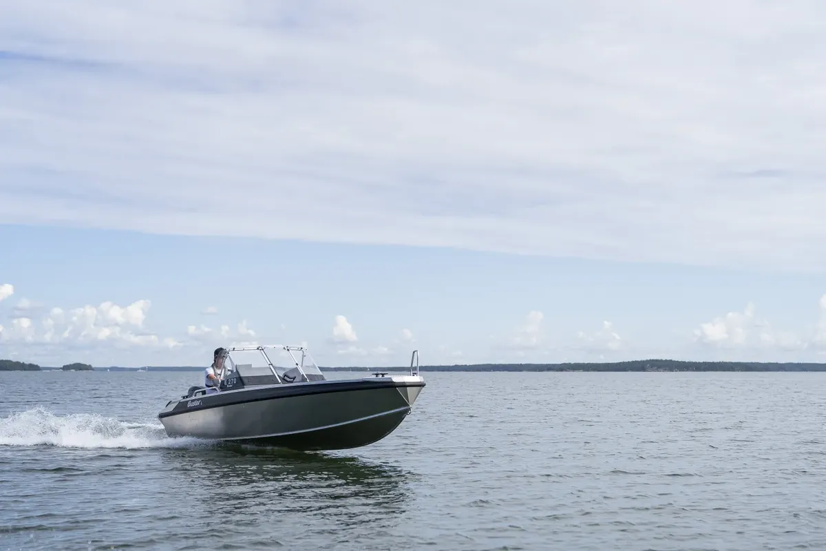 Buster L2: Boat cruising on water