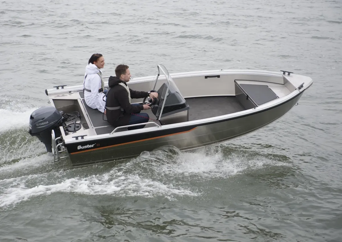 Buster S1: Boat cruising on water