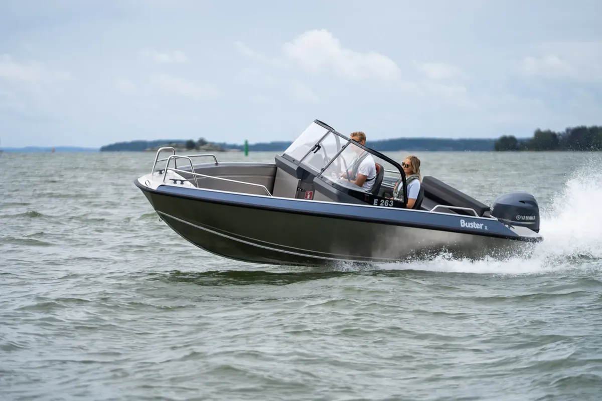Buster X: Boat cruising on water