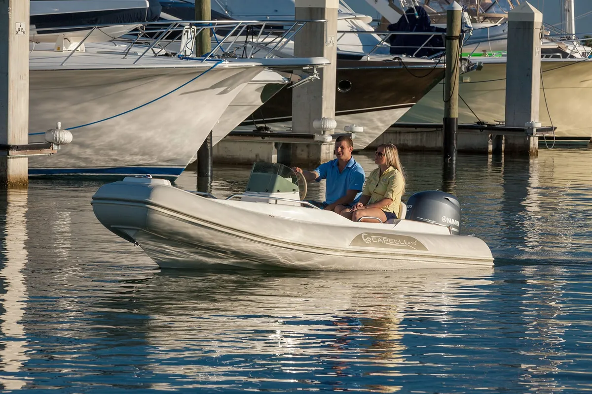 Capelli Tempest 410 Yacht Tender: Rubber dinghy cruising amongst yachts