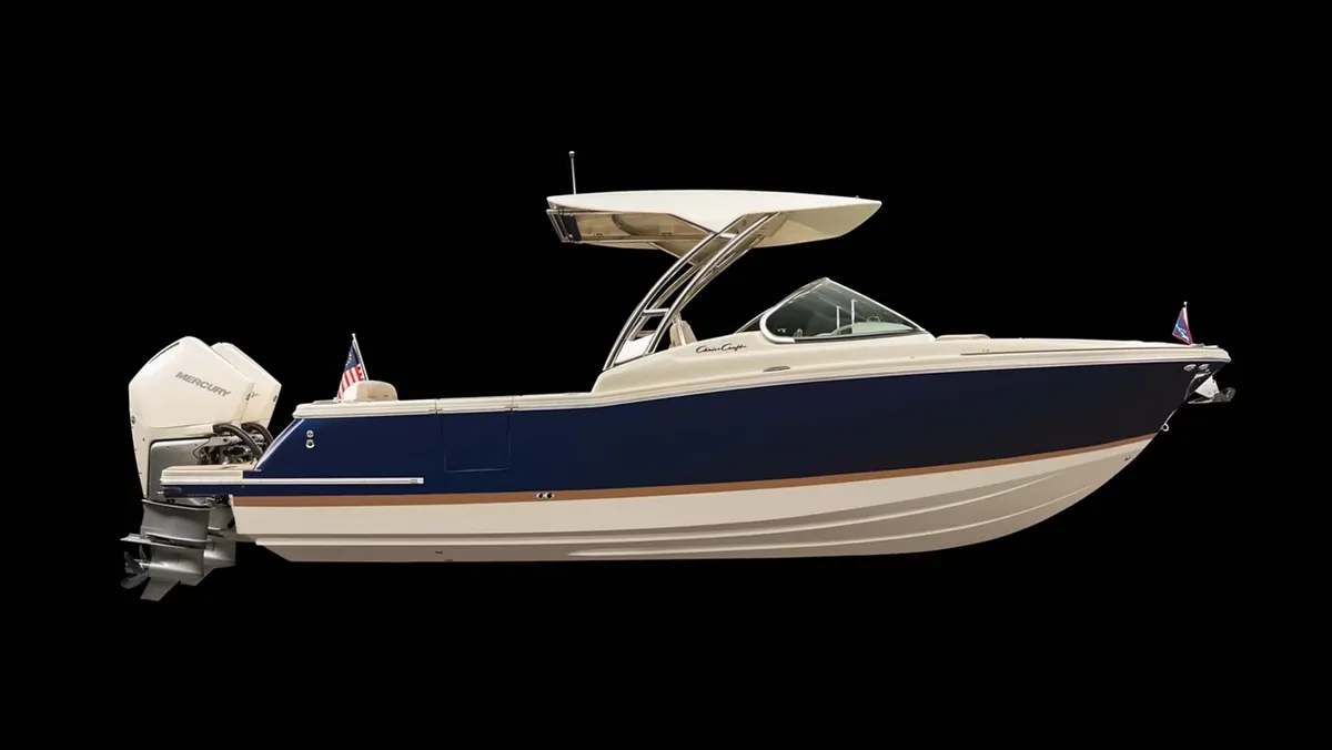 Chris-Craft Calypso 28: Side view of a boat against a black background