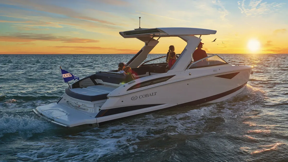 Cobalt Boats A29: Boat cruising at sunset