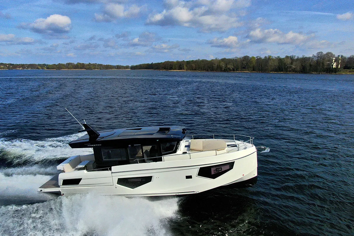 Cobra Yachts Gran Maestro 43: White boat travelling at speed