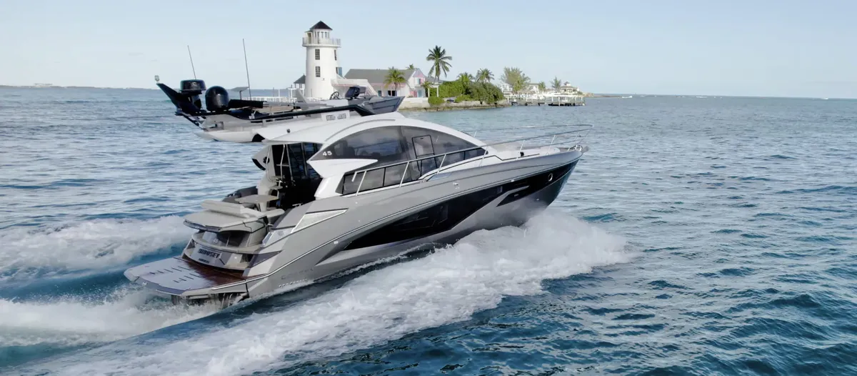 Cobrey Yachts 42/45 Fly: Boat cruising past a lighthouse