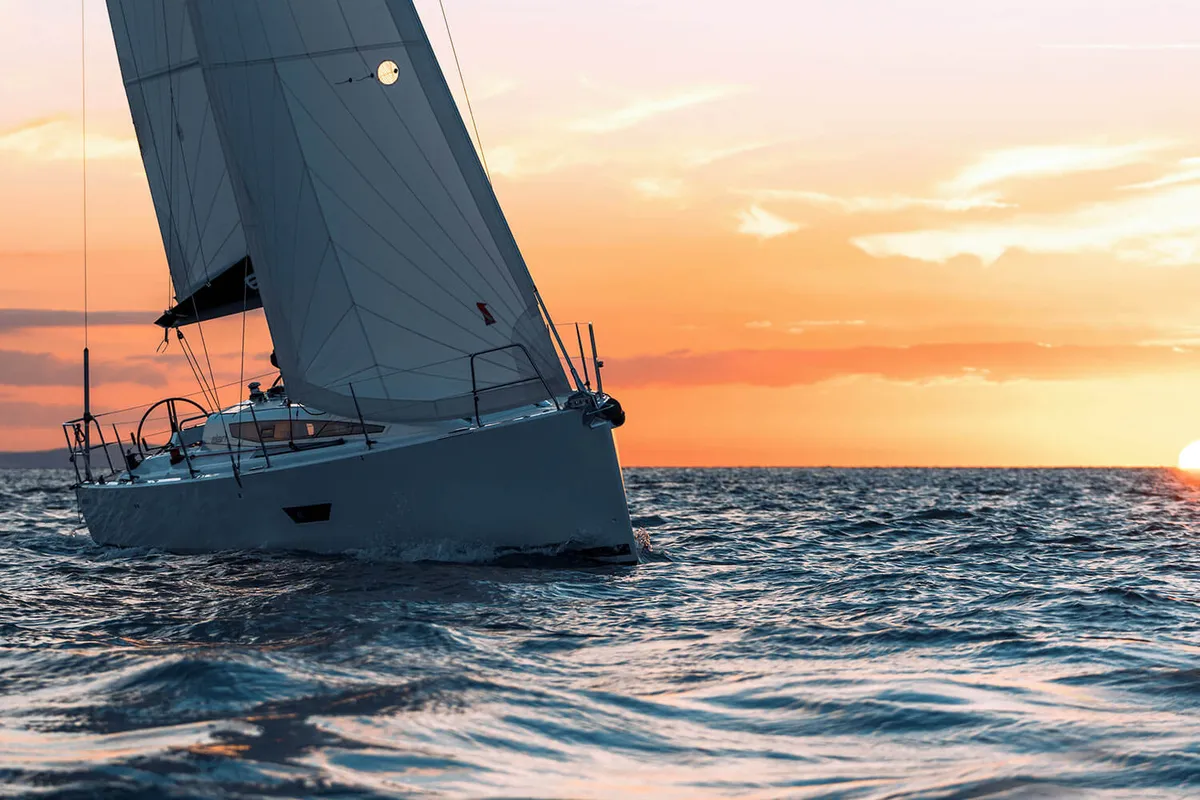 Elan Yachts E4: Sailing boat at sunset