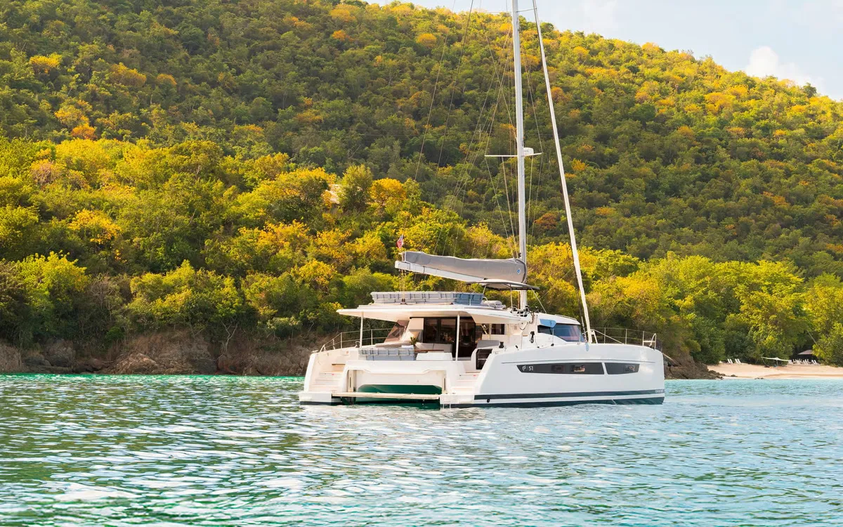 Fountaine Pajot FP51: Catamaran at anchor off the coast