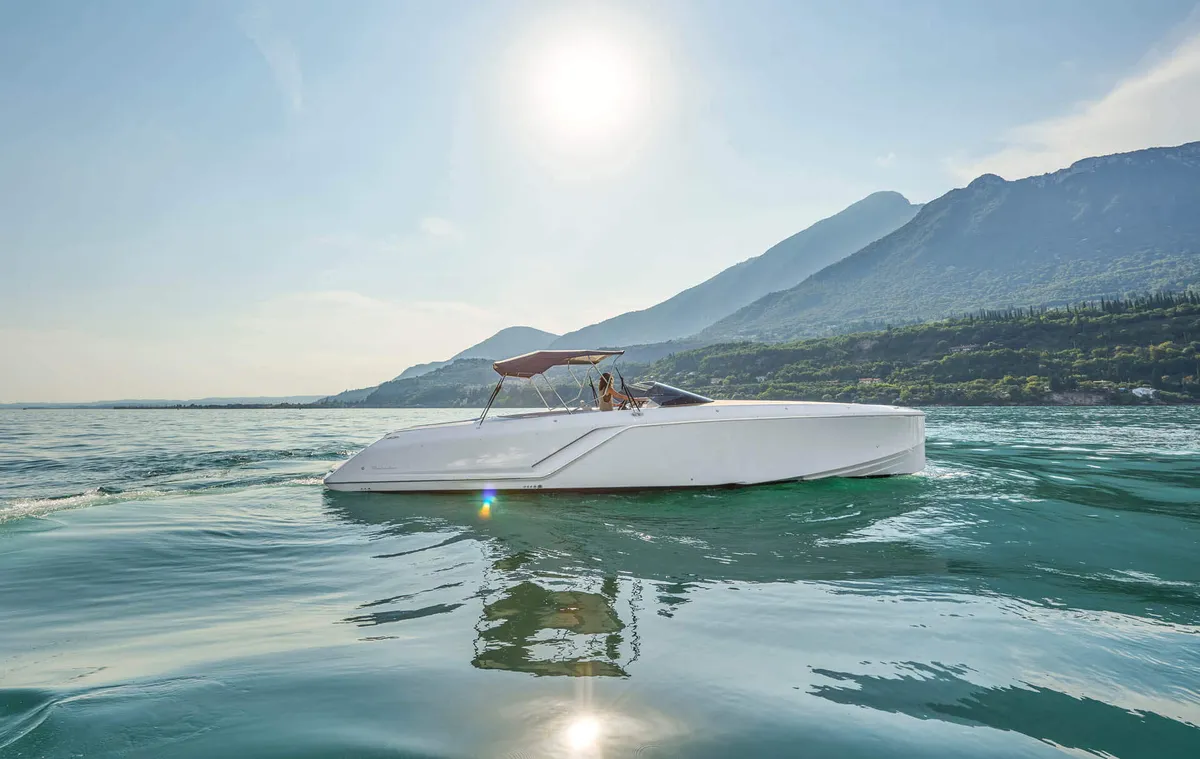 Frauscher 1212 Ghost: White boat cruising on a lake