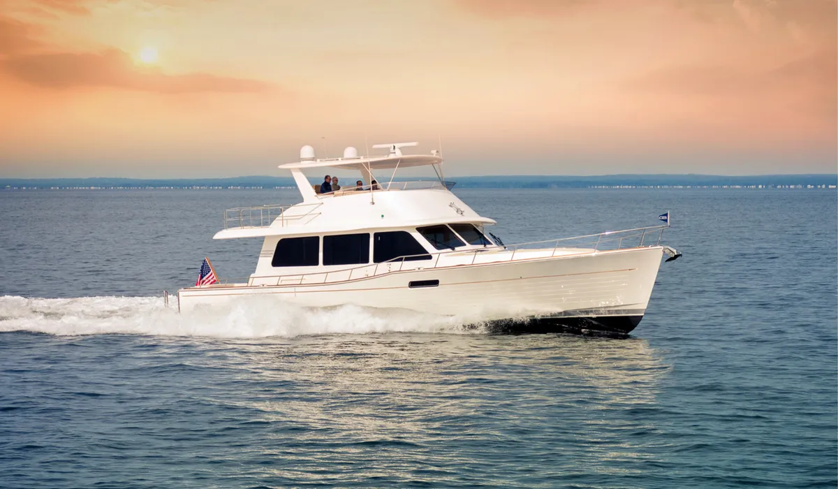 Grand Banks 60: Boat cruising at sunset