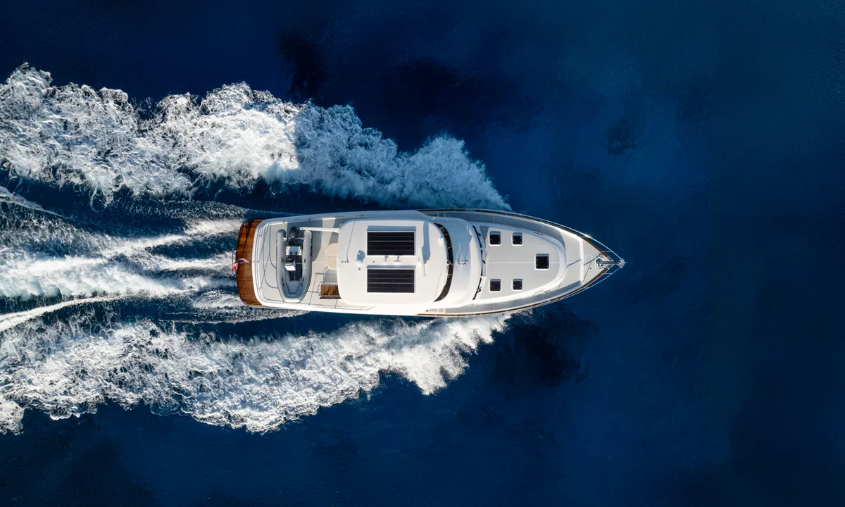Grand Banks 62: Boat cruising at sea from a bird's-eye view