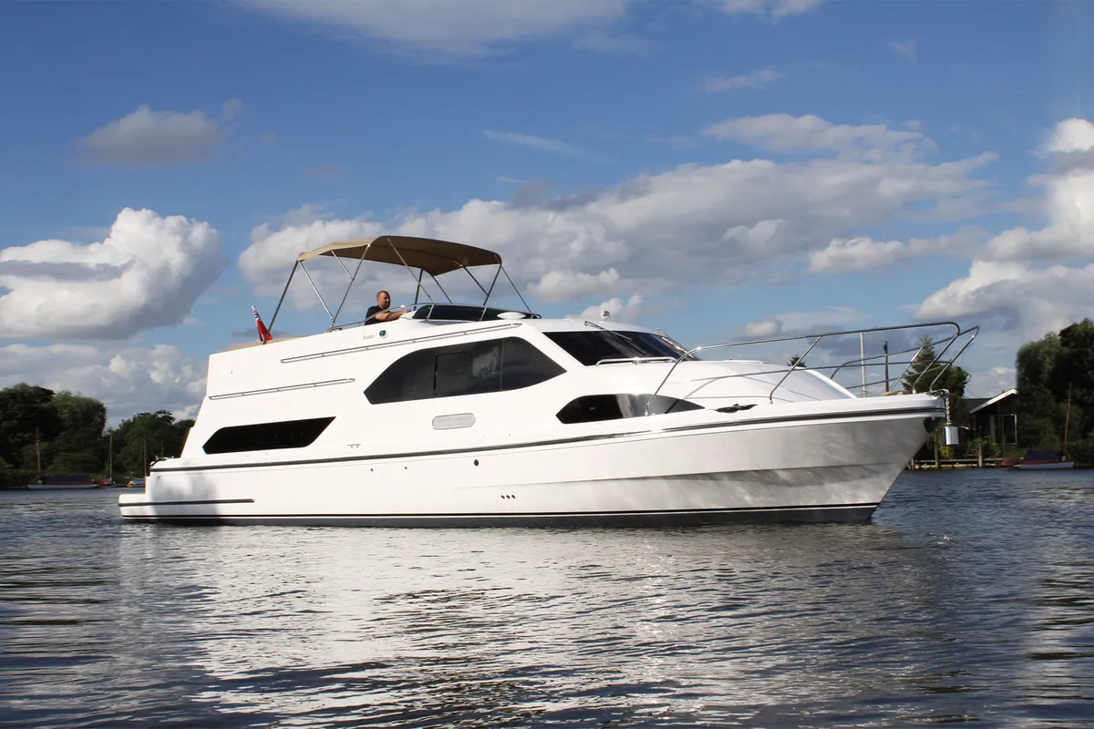 Haines Marine Elegance 42: White motorboat cruising on the water