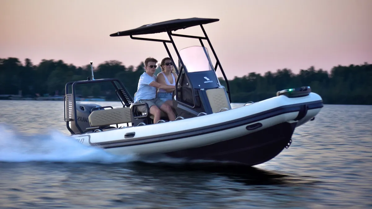 Highfield Boats Sport 560: Boat cruising on water