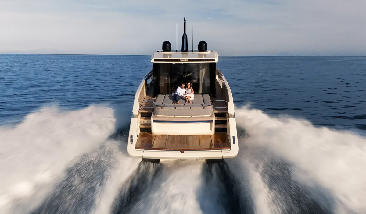 Invictus Yacht ST550: Boat cruising at sea with waves
