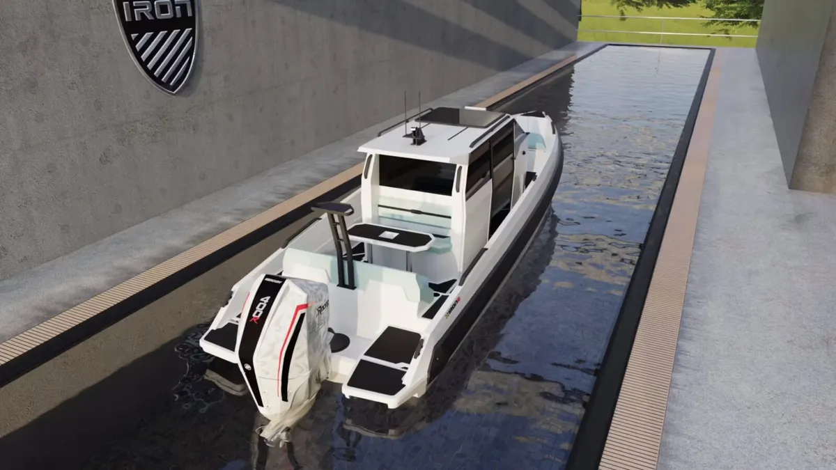 IRON Boats 827 Coupe: White boat by a water basin