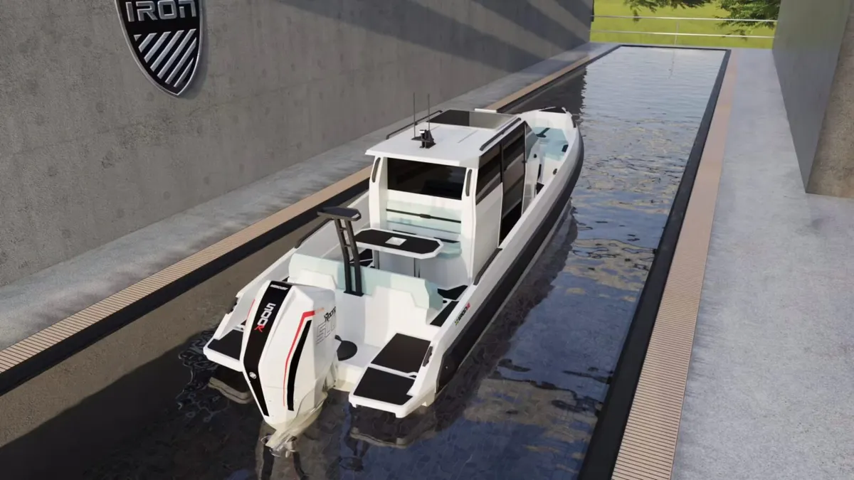 IRON Boats 907 Coupe: White boat at the dock