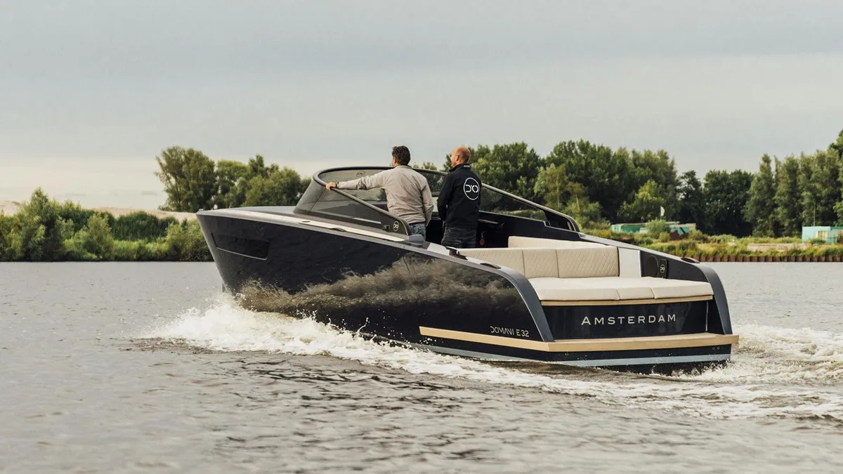 JR Yachts E32: Boat cruising on water with men