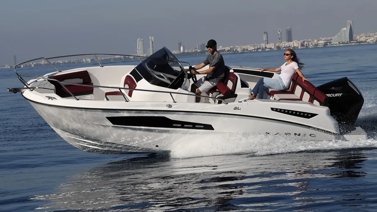 Karnic Boats SL641: Boat cruising against a skyline