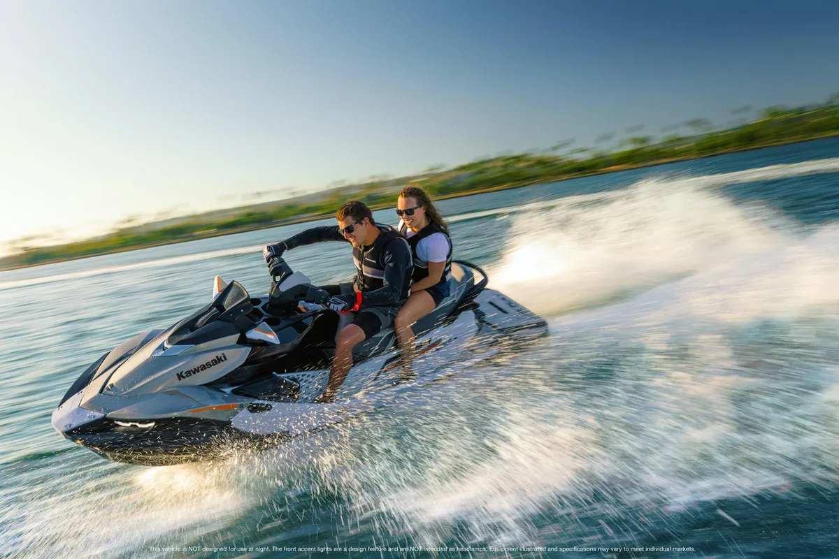 Kawasaki Jet Ski STX 160LX: A jet ski with two people on board
