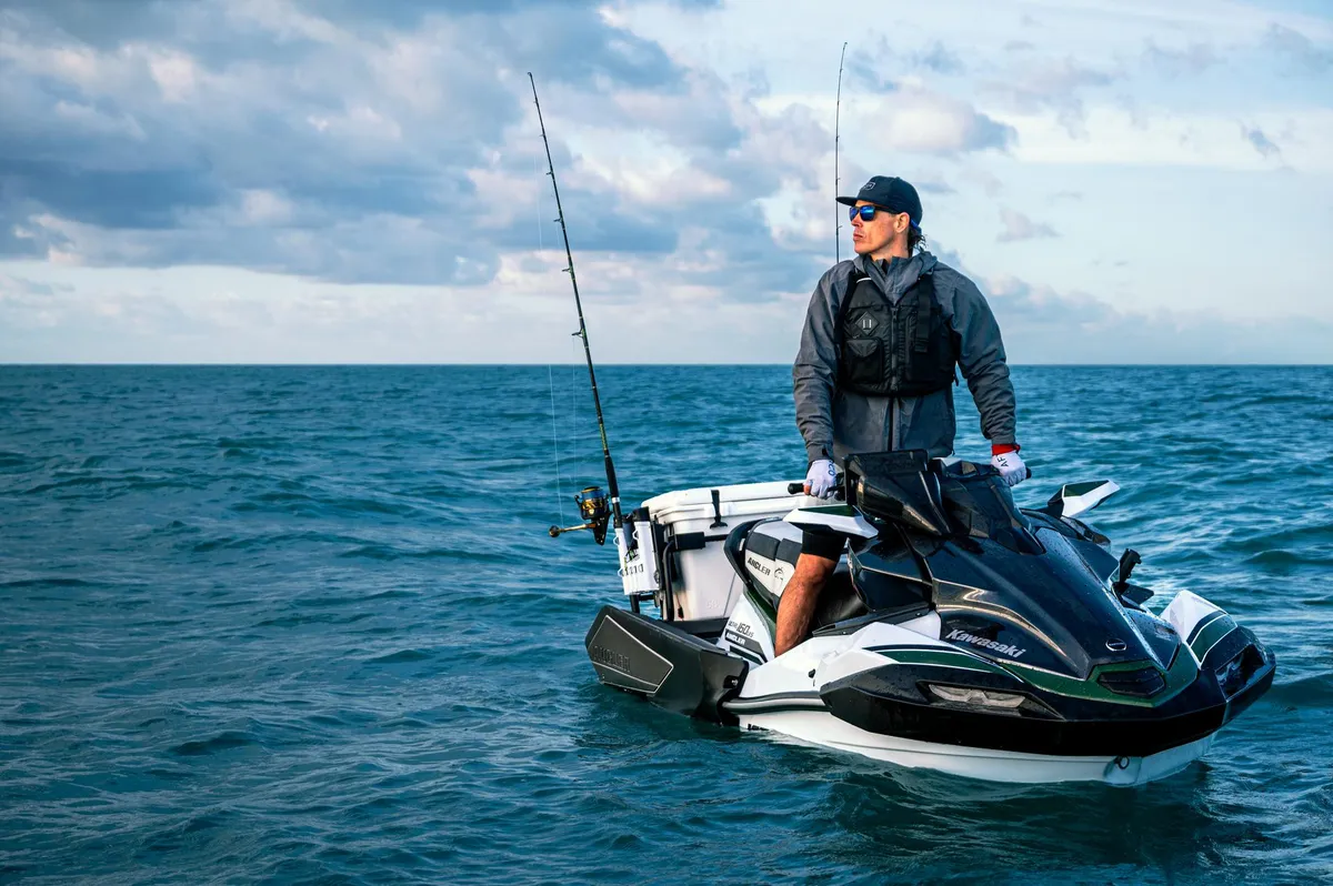 Kawasaki Jet Ski Ultra 160LX-S Angler: A man fishing from a jet ski