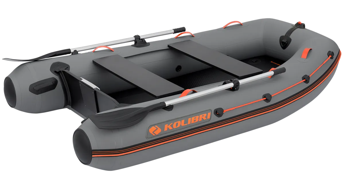 Kolibri KM-270XL: Inflatable boat with paddles on a white background