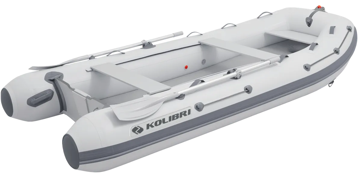 Kolibri KM-360DXL: Inflatable boat with oars on a white background