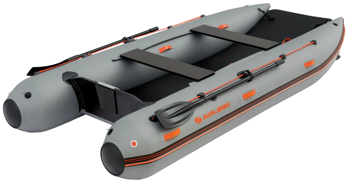 Kolibri KM-380CM: Inflatable boat with paddle on a white background