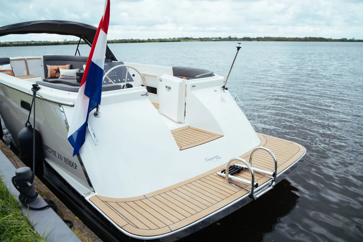 Lifestyle 777 Tender: Aft deck of a boat flying the Dutch flag