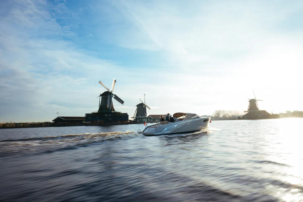 Lifestyle 818 Cabin: Boat cruising past windmills