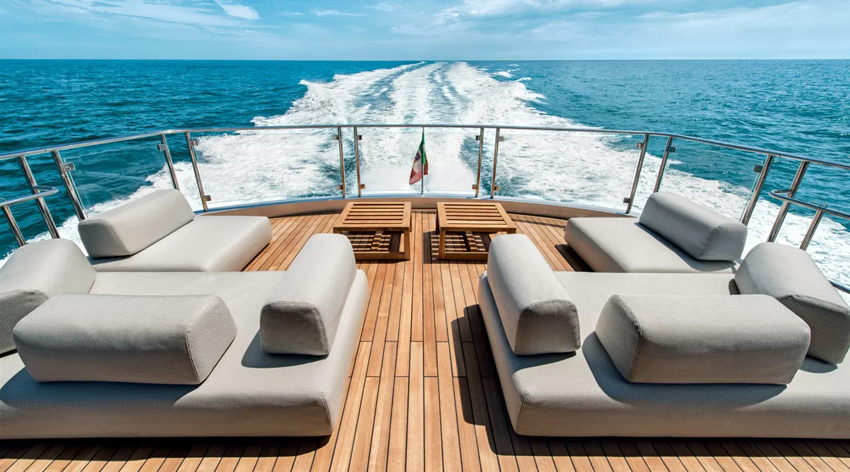 Monte Carlo Yachts MCY 105: Aft deck with lounge sofas at sea