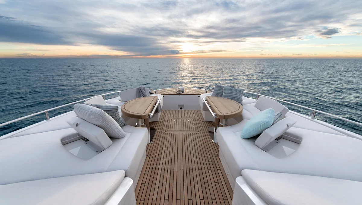 Monte Carlo Yachts MCY 70: Foredeck with lounge sofas at sunset