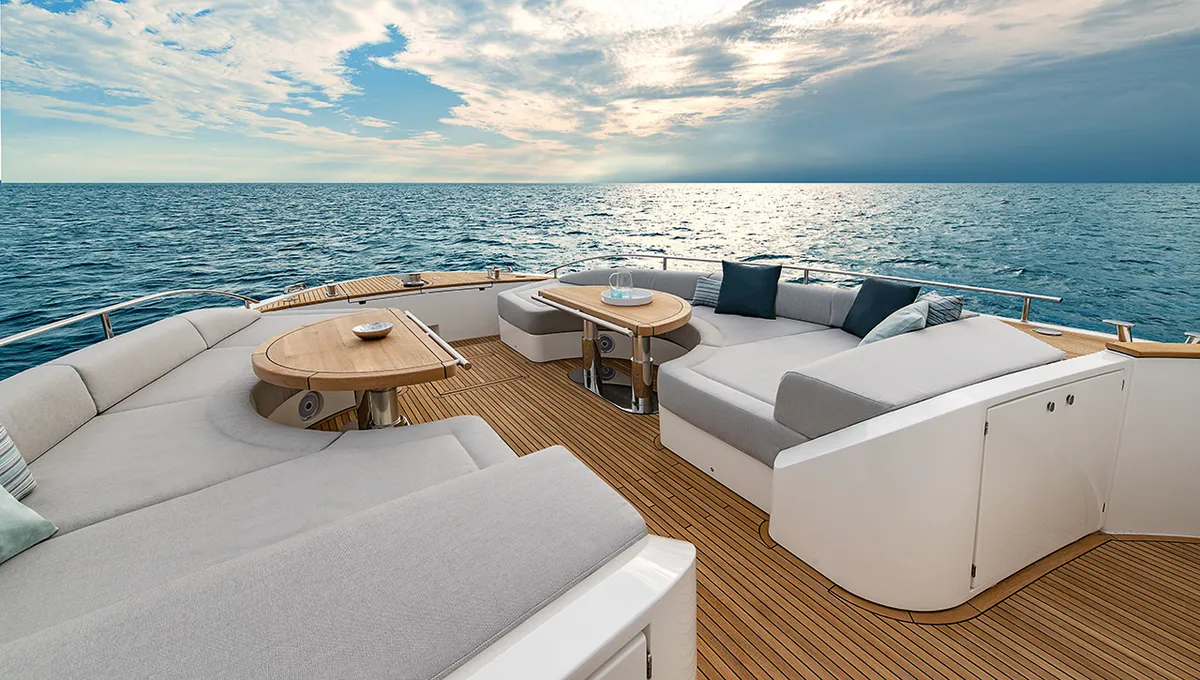 Monte Carlo Yachts MCY 76 Skylounge: Fore deck with lounge sofa and table