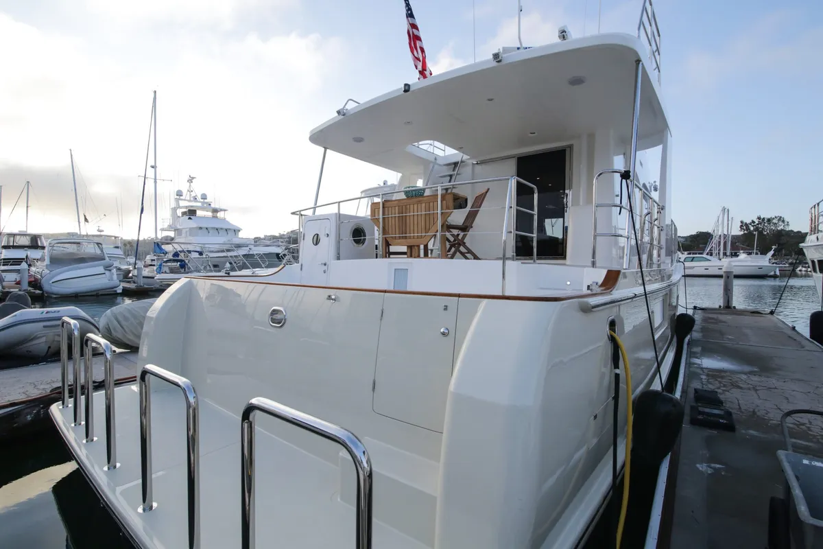 Nordhavn 59CP: Aft deck of a yacht in a marina