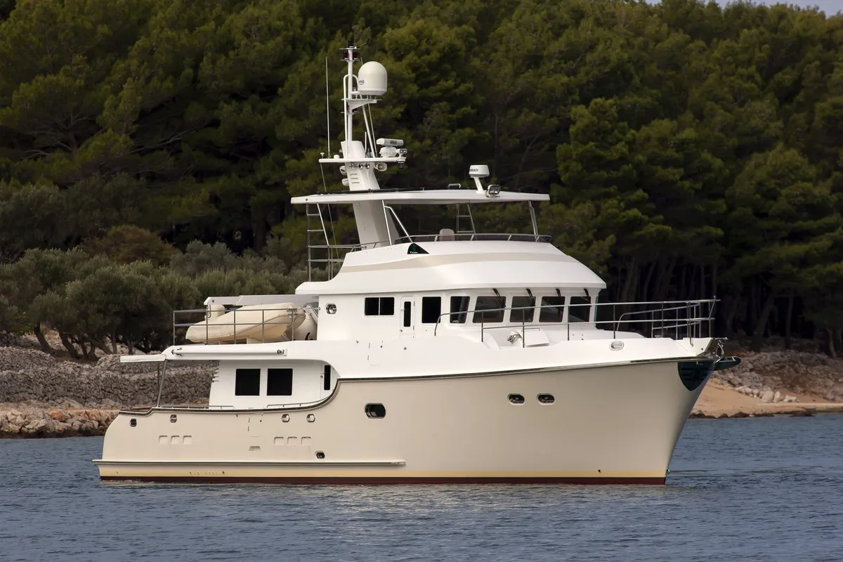Nordhavn 68: Motor yacht at anchor off the coast