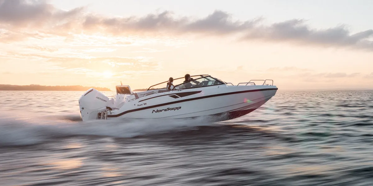 Nordkapp Boats Avant 705: Boat cruising at sunset