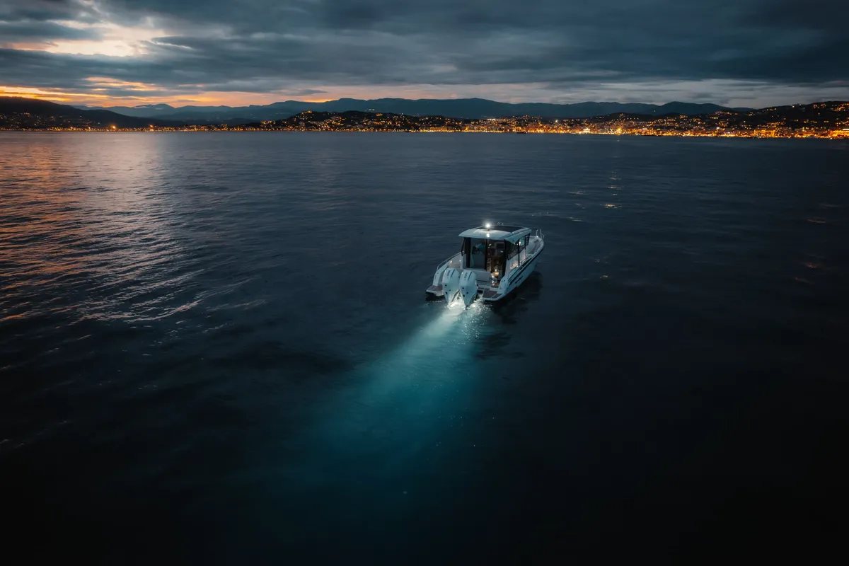 Nordkapp Boats Coupe 905: Boat cruising at sea in the evening