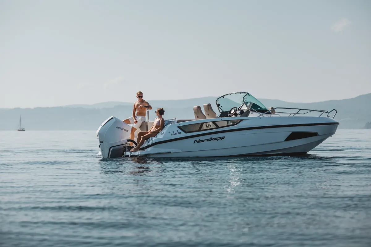 Nordkapp Boats Enduro 805: Boat cruising on water with people on board