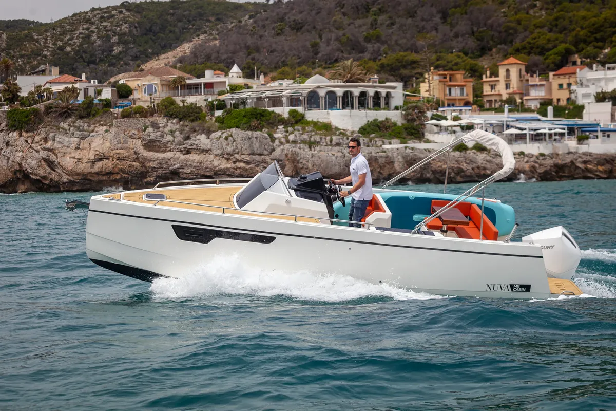 NUVA Yachts M8 Cabin: Boat cruising near the coast