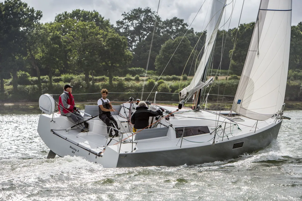Pogo Structures 30: Sailing boat with crew on the water