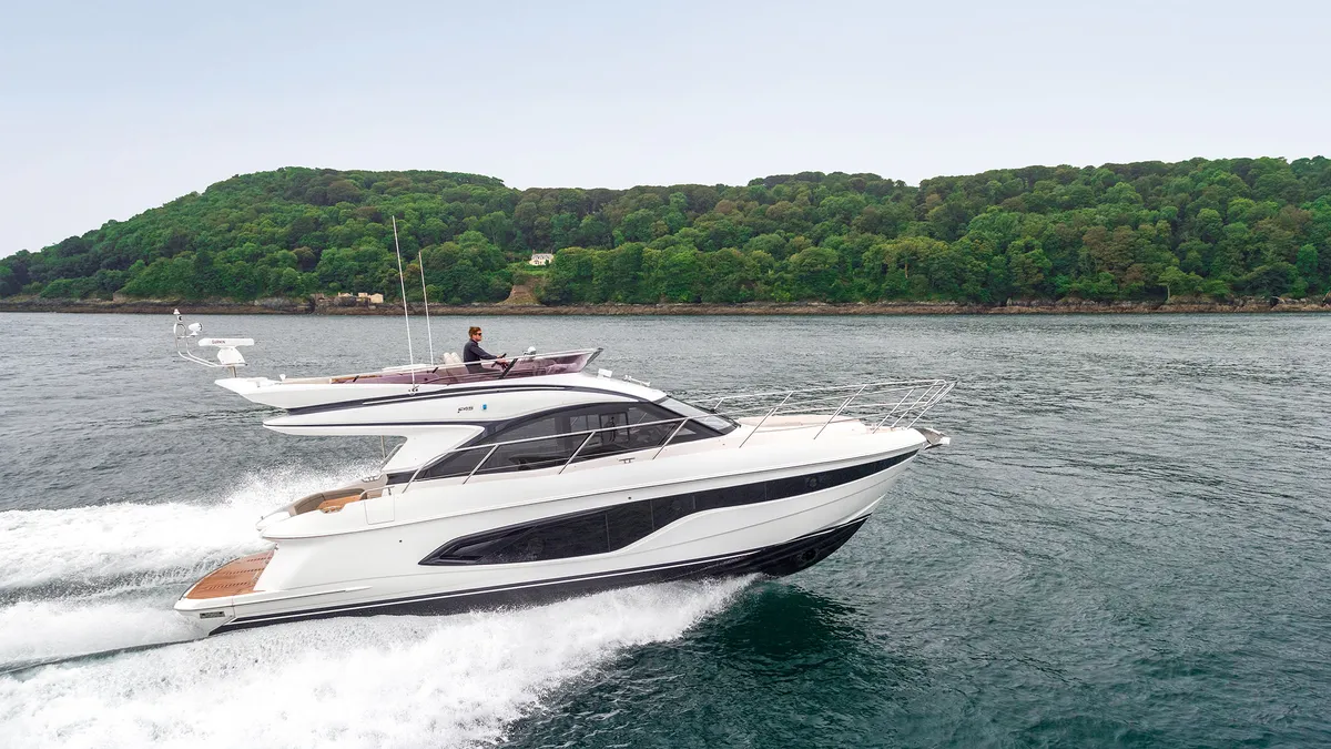 Princess F45: White boat cruising on the water