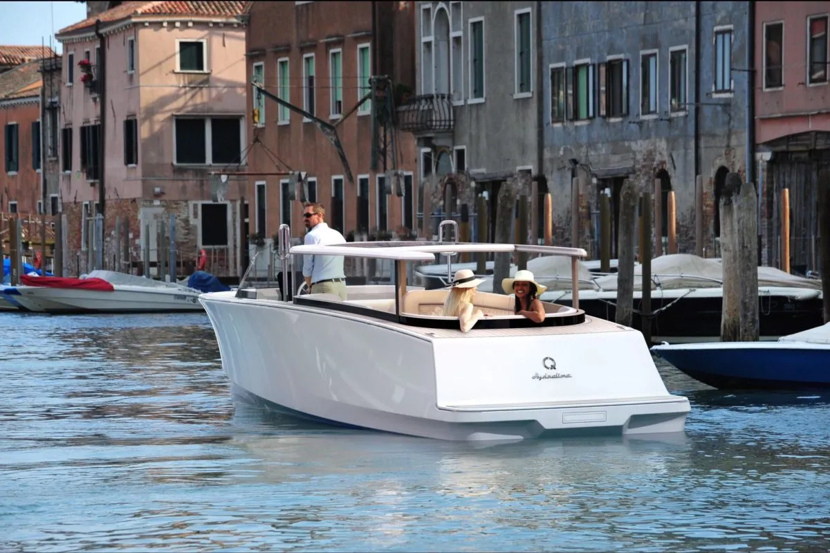 Q Yachts Q30 Limousine: Boat cruising on a canal
