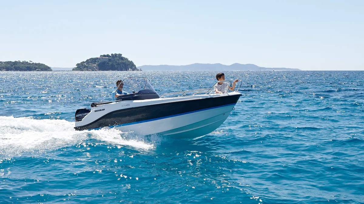 Quicksilver 455 Open: Speedboat cruising across the sea