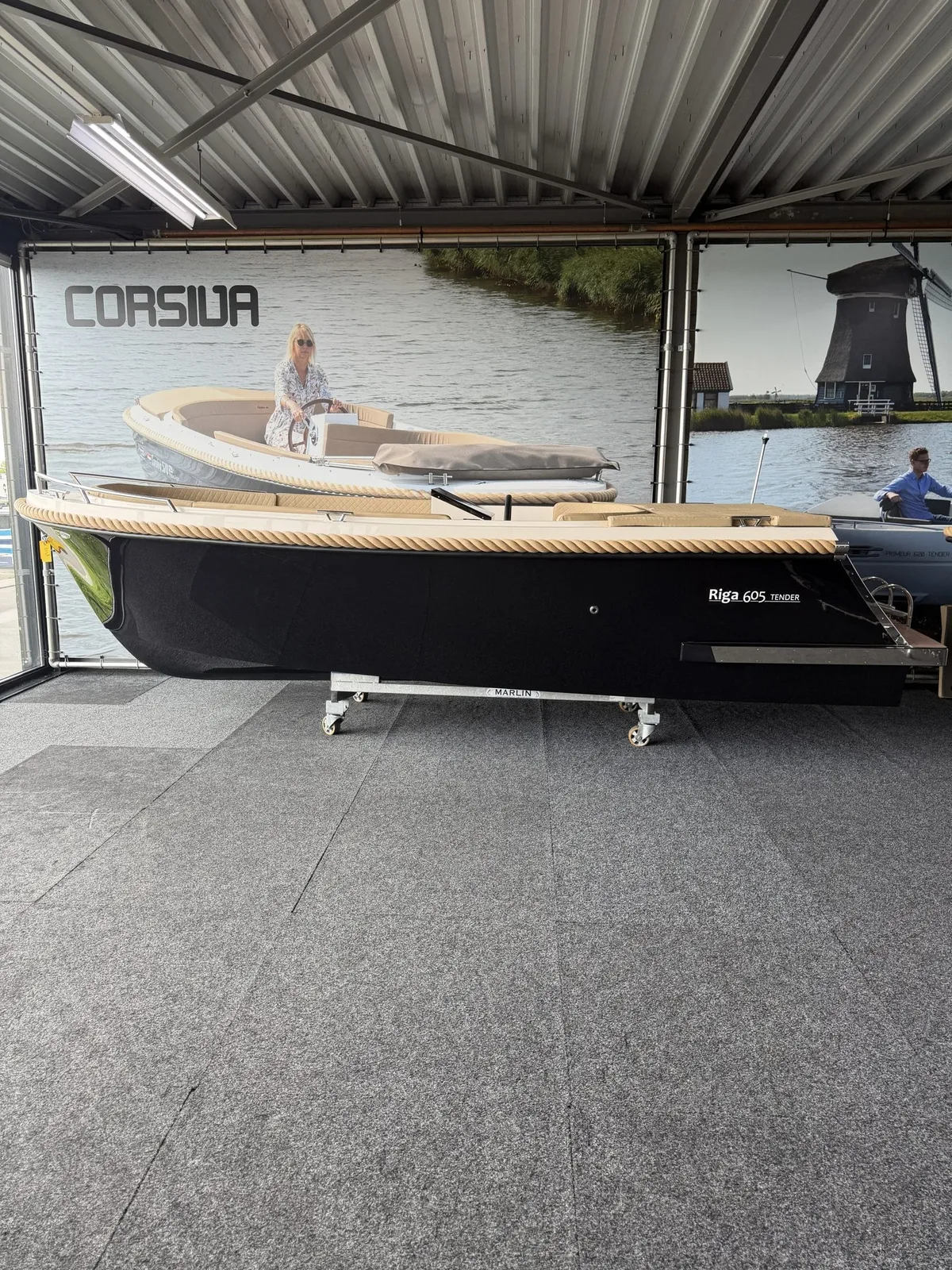 Riga Boats 605 Tender: Black tender in the showroom