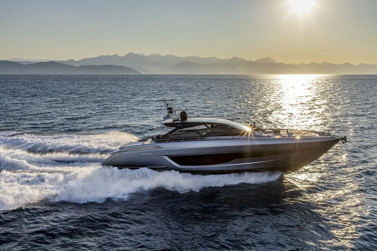 Riva 68' Diable: Yacht cruising at sea at sunset